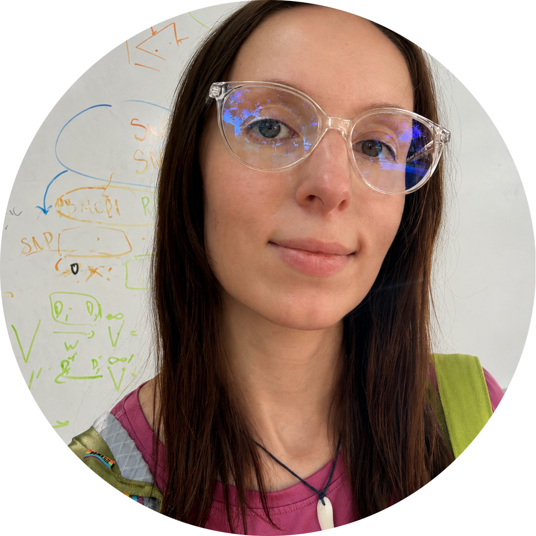 Marina Terekhova in front of a whiteboard with scientific notes